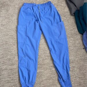 Med couture peaches jogger scrub pants in ceil blue. Size small